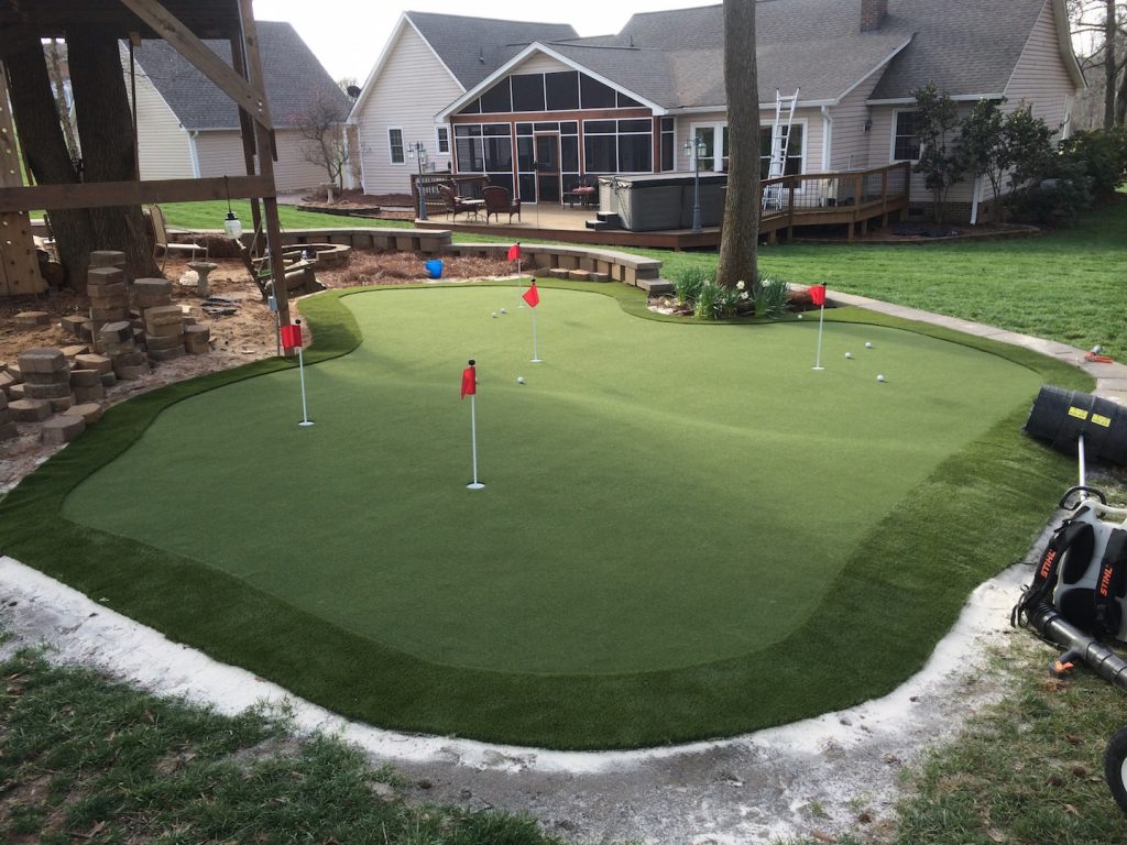 Large backyard artificial putting green in North Carolina