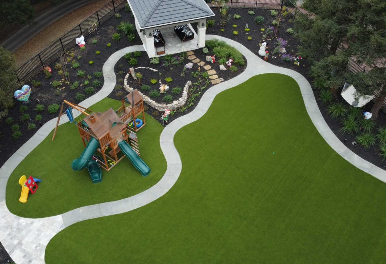 Residential artificial grass backyard playground