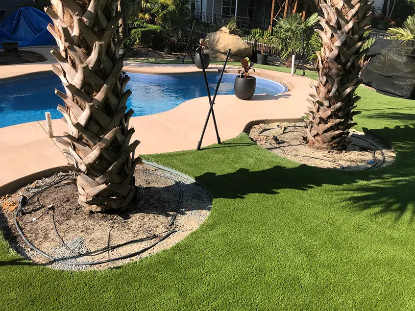 Backyard artificial grass pool area installed by SYNLawn