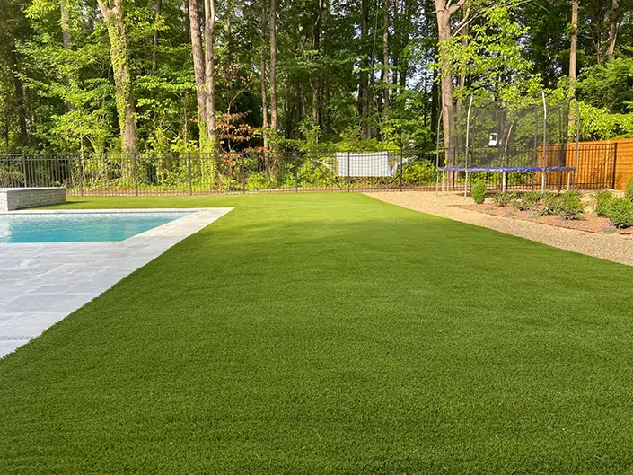 Artificial grass backyard pool area from SYNLawn